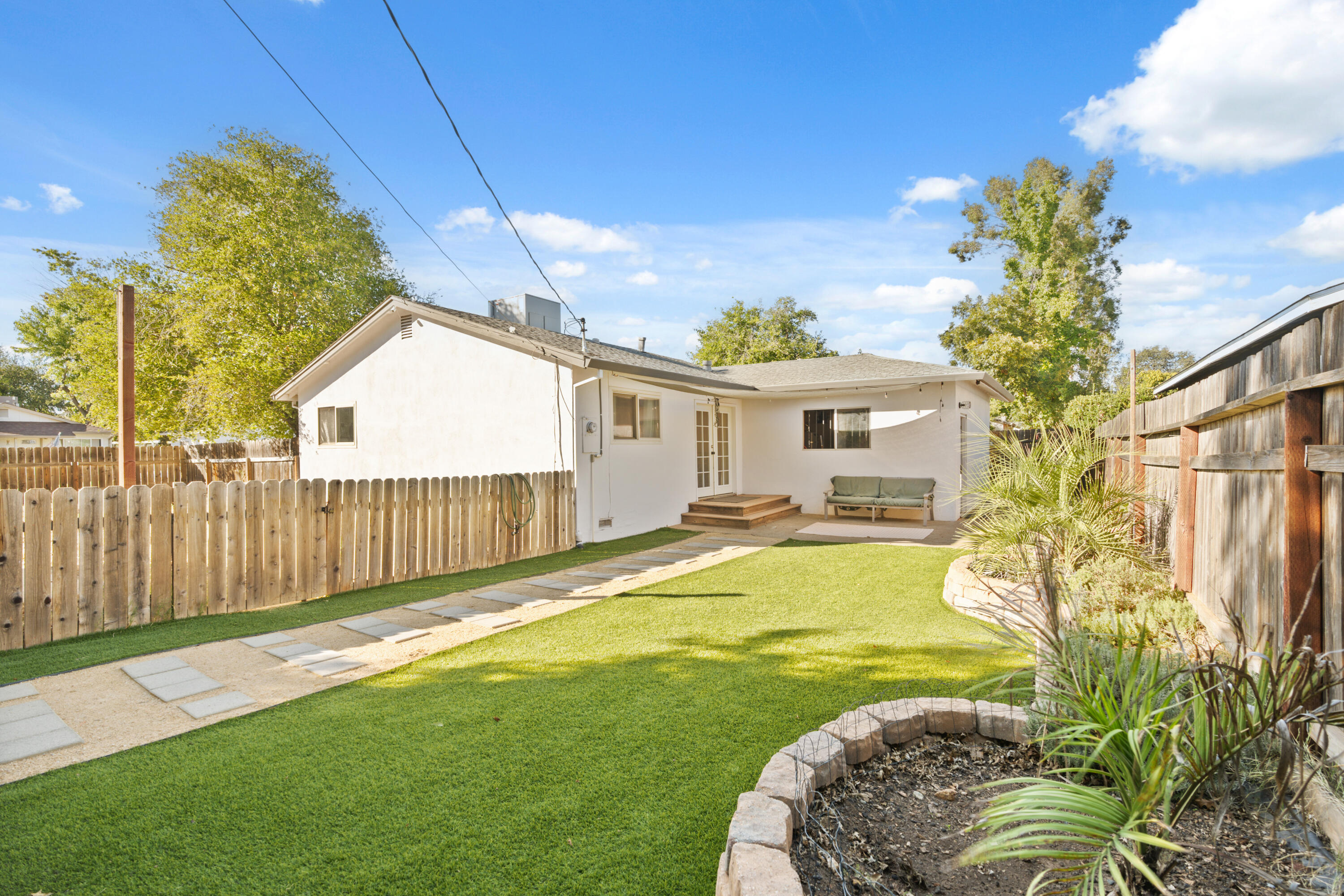 2041 Jupiter Terrace Redding, CA 96002 - Photo 24 of 32 a view of a house with a swimming pool