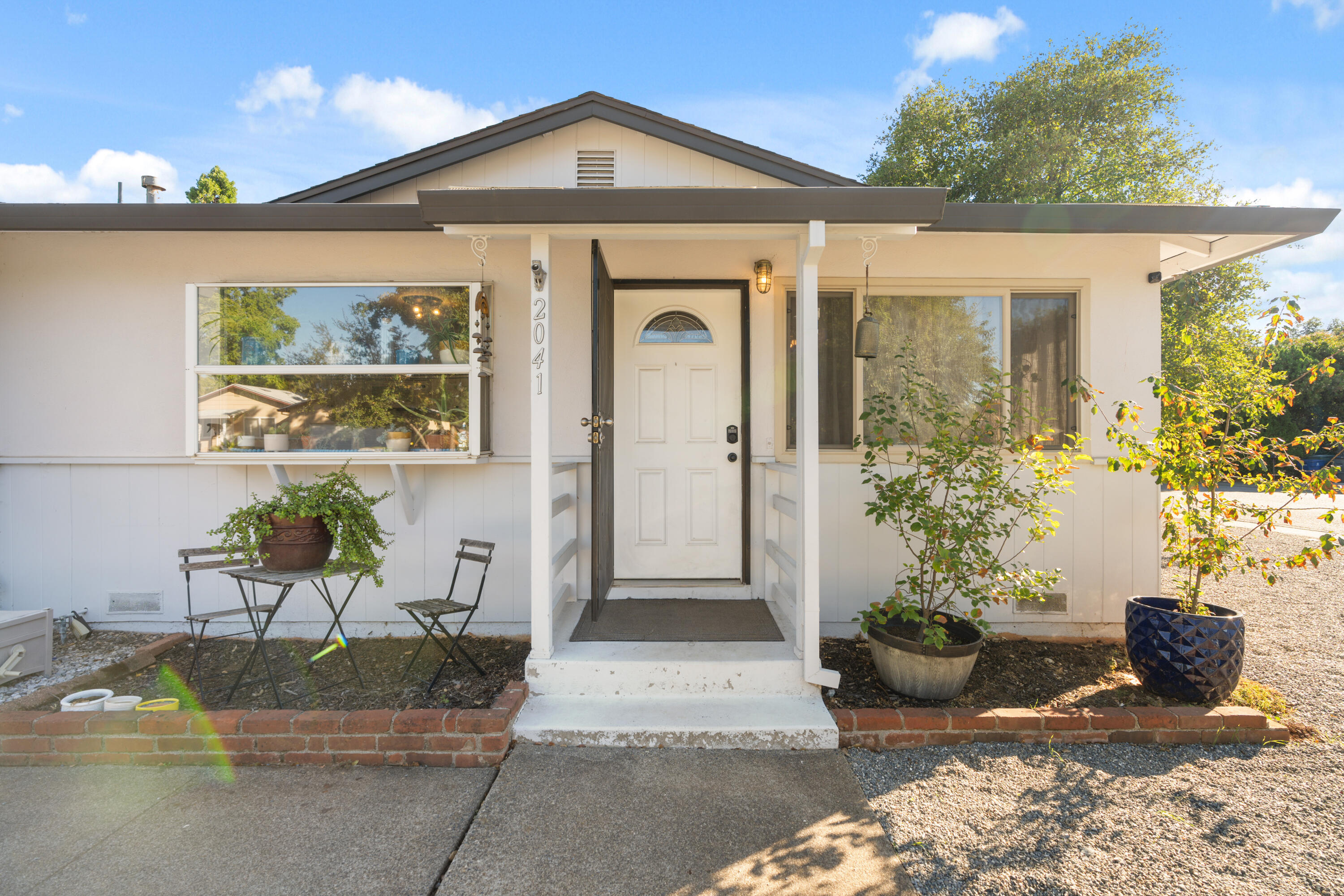 2041 Jupiter Terrace Redding, CA 96002 - Photo 29 of 32 a front view of a house with garden