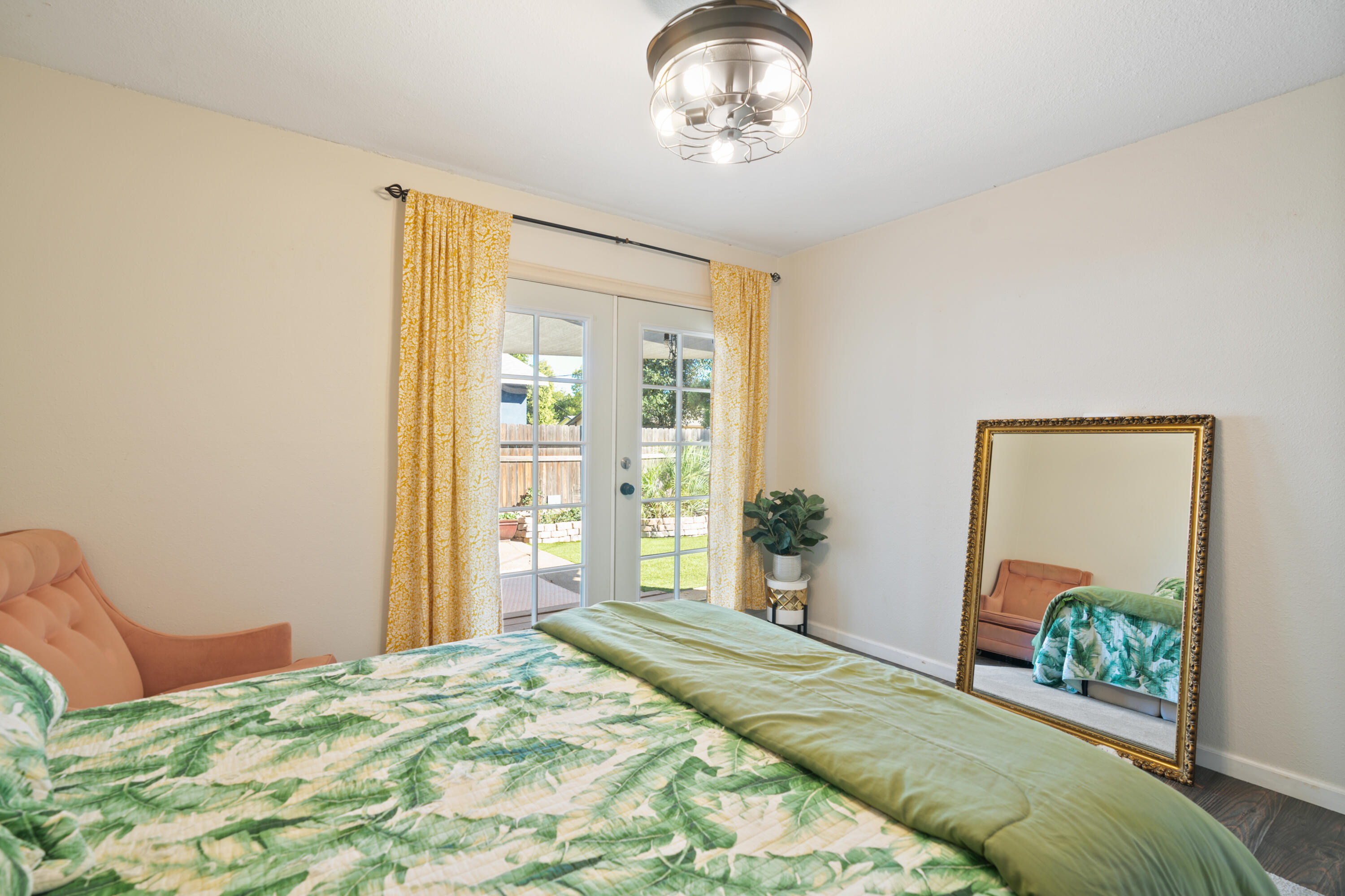 2041 Jupiter Terrace Redding, CA 96002 - Photo 3 of 32 a bedroom with a bed and a chandelier