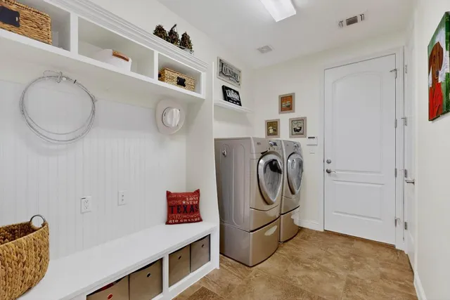 a utility room with dryer and washer