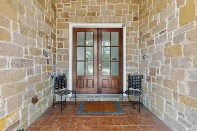 a view of a room with windows