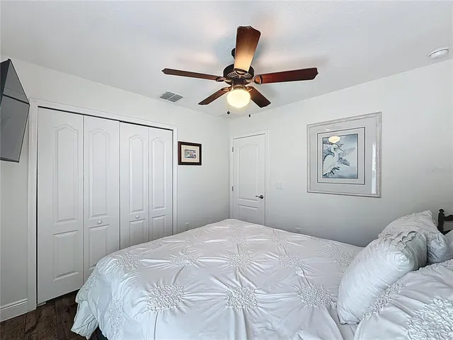 a view of a swimming pool with a yard