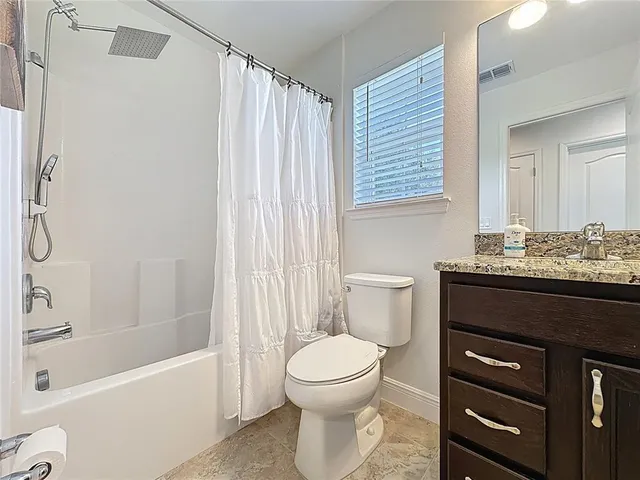 a view of a lake with a big yard