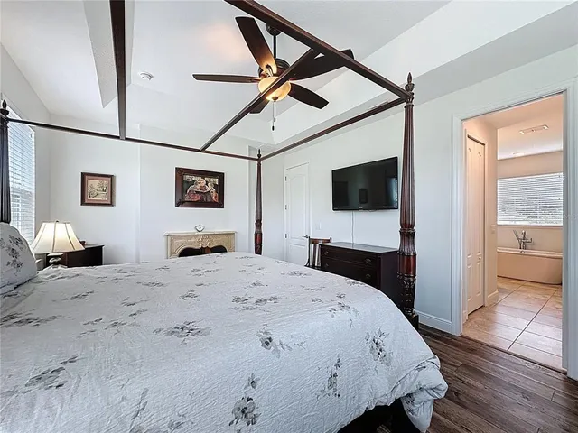 a white bath tub sitting next to a white sink