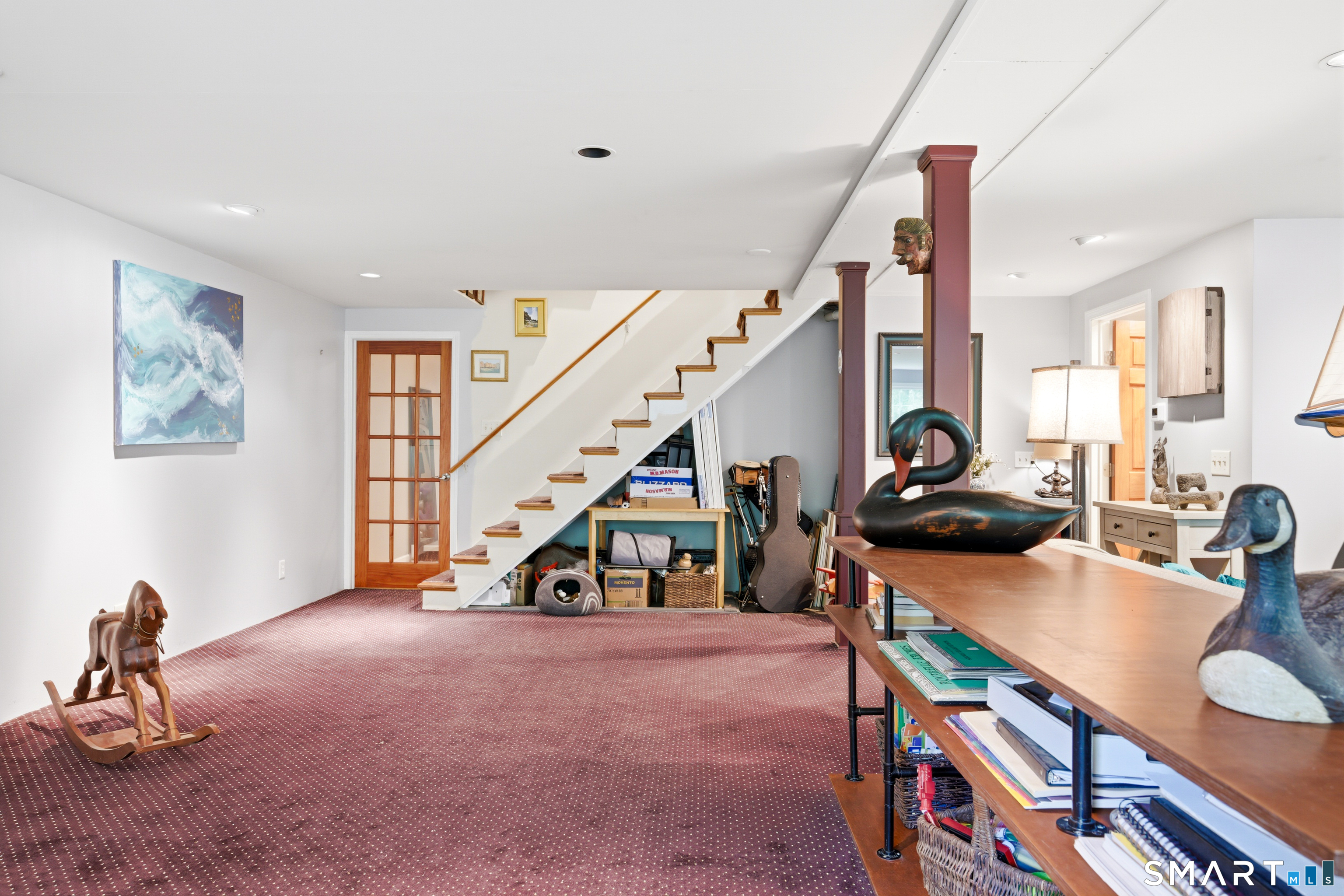 49 River Road Essex, CT 06426 - Photo 23 of 33 Fantastic finished walk out lower level