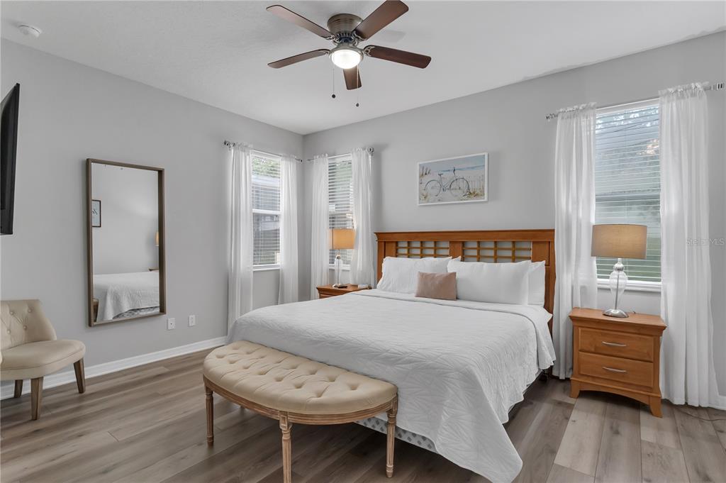 506 Kettering Road Davenport, FL 33897 - Photo 14 of 45 a bedroom with a bed and a window