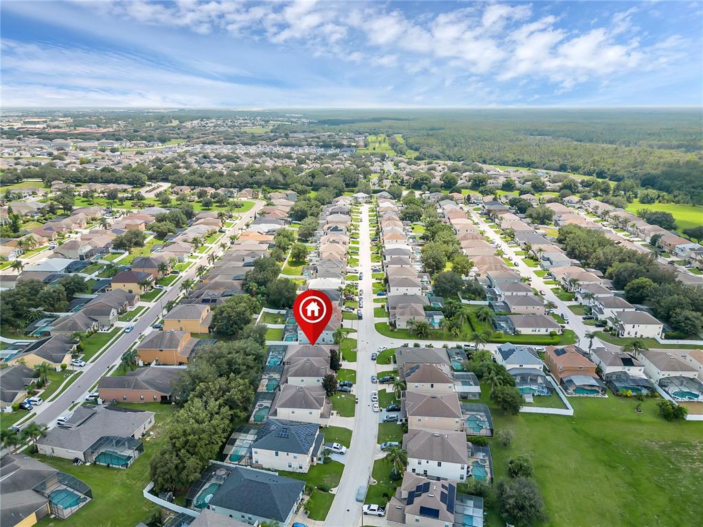 506 Kettering Road Davenport, FL 33897 - Photo 39 of 45 an aerial view of residential houses with outdoor space and river