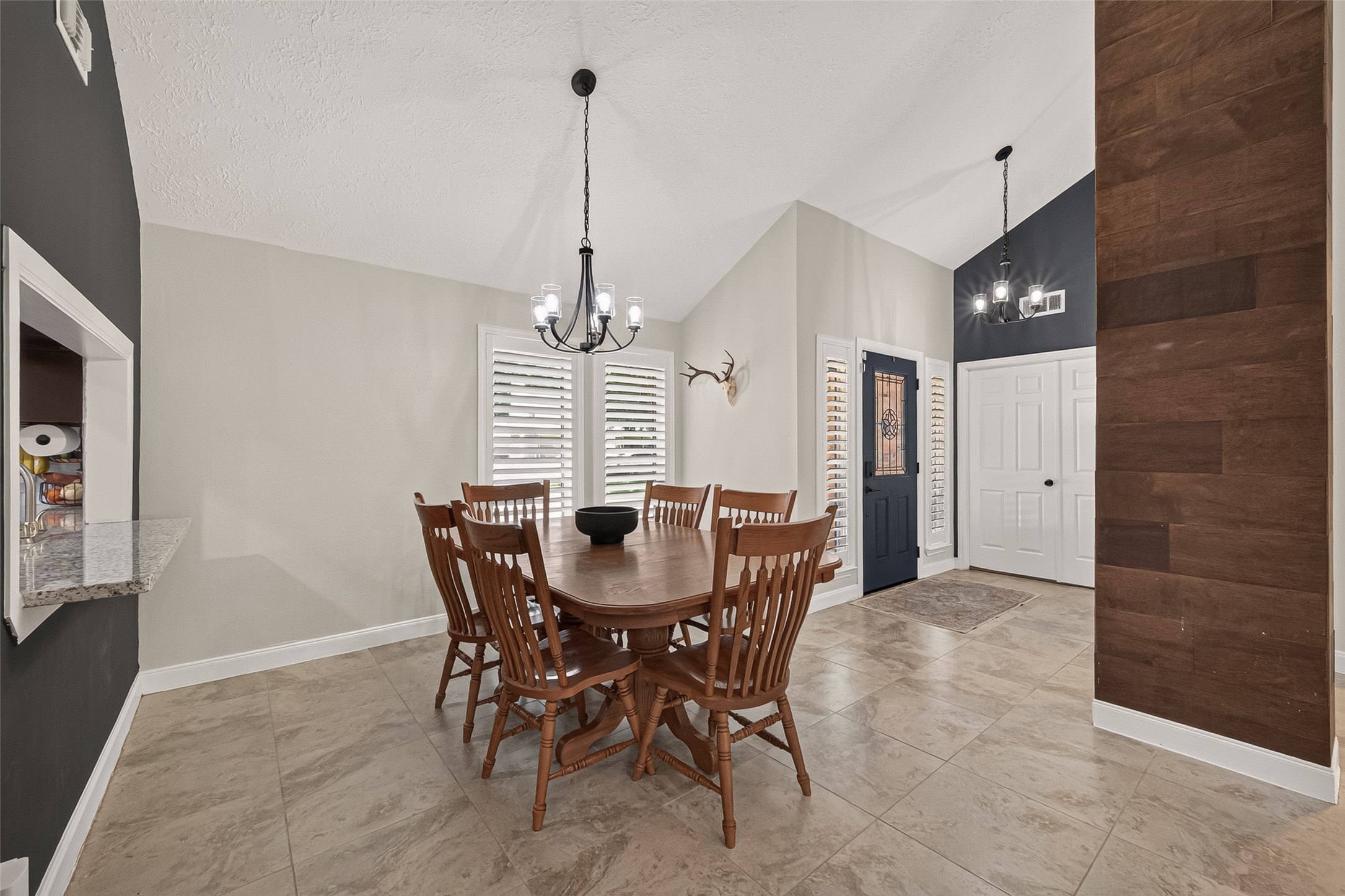 22939 Indian Ridge Drive Katy, TX 77450 - Photo 9 of 35 Spacious dining room. White doors to the right lead to the flex room, which can be used as an office, second living room, or extra bedroom.