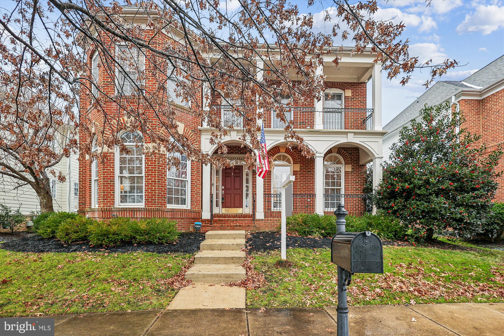 706 Crisfield Way Annapolis, MD 21401 - Photo 1 of 71 a front view of a house with garden
