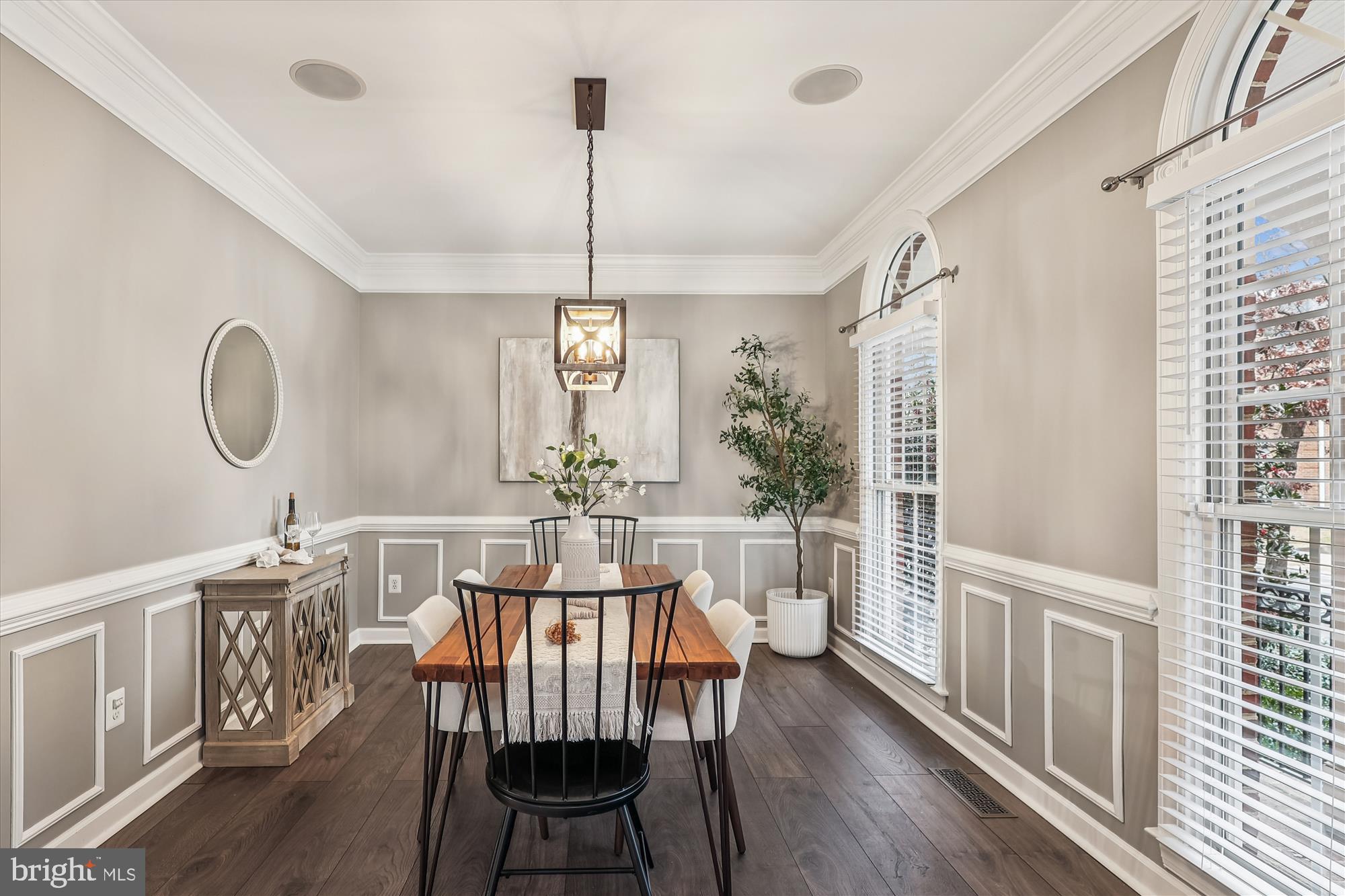 706 Crisfield Way Annapolis, MD 21401 - Photo 11 of 71 a view of a dining room with furniture window and wooden floor
