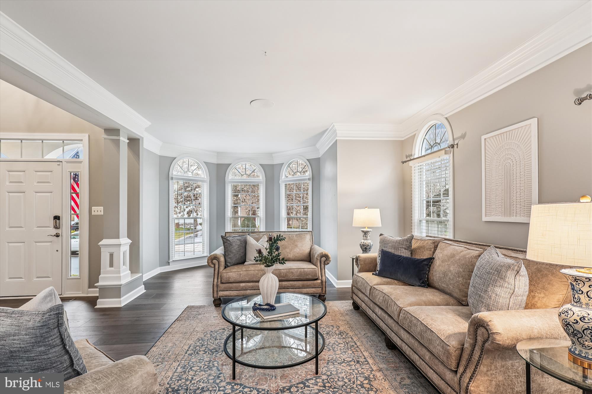 706 Crisfield Way Annapolis, MD 21401 - Photo 12 of 71 a living room with furniture and a large window
