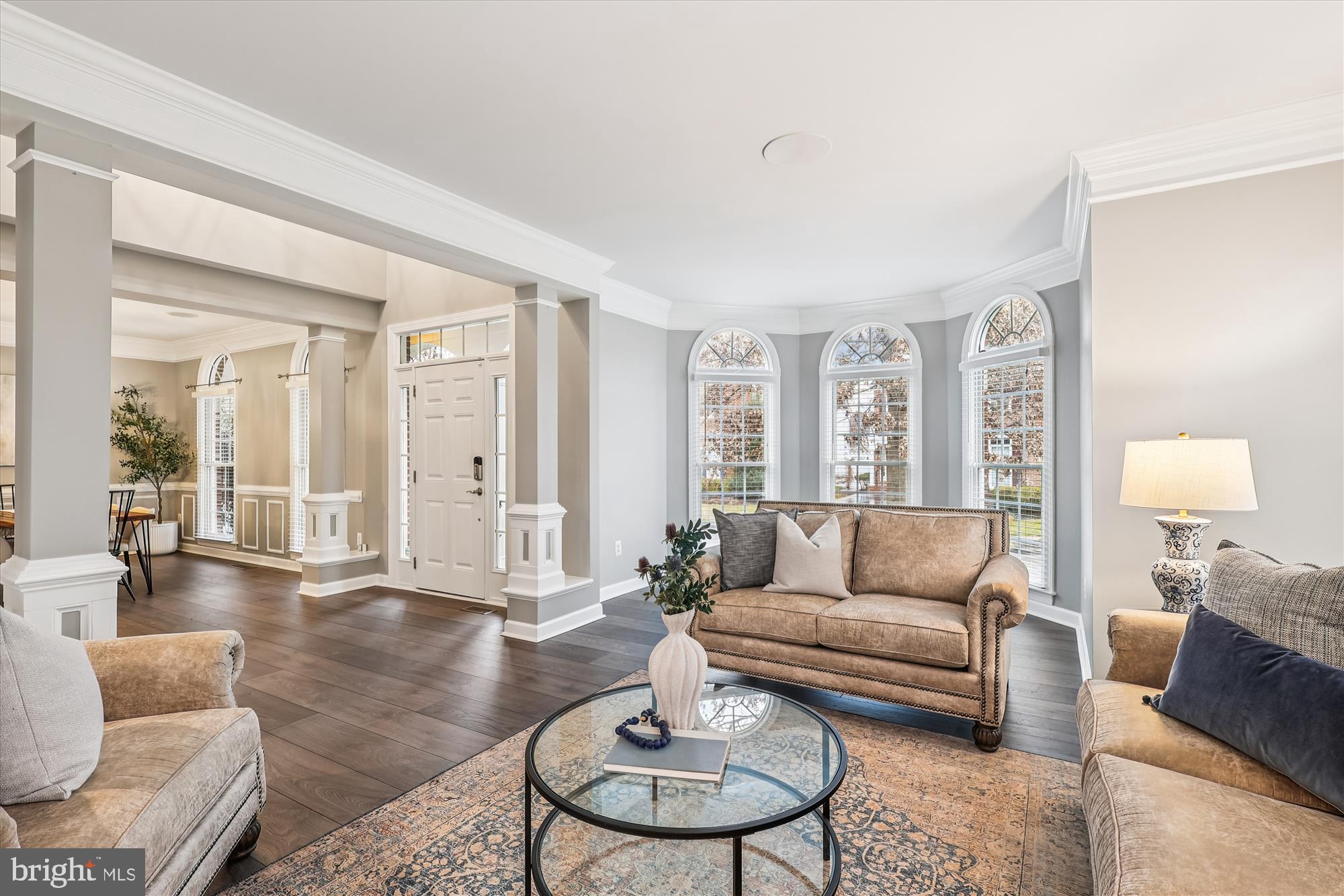 706 Crisfield Way Annapolis, MD 21401 - Photo 13 of 71 a living room with furniture and a large window