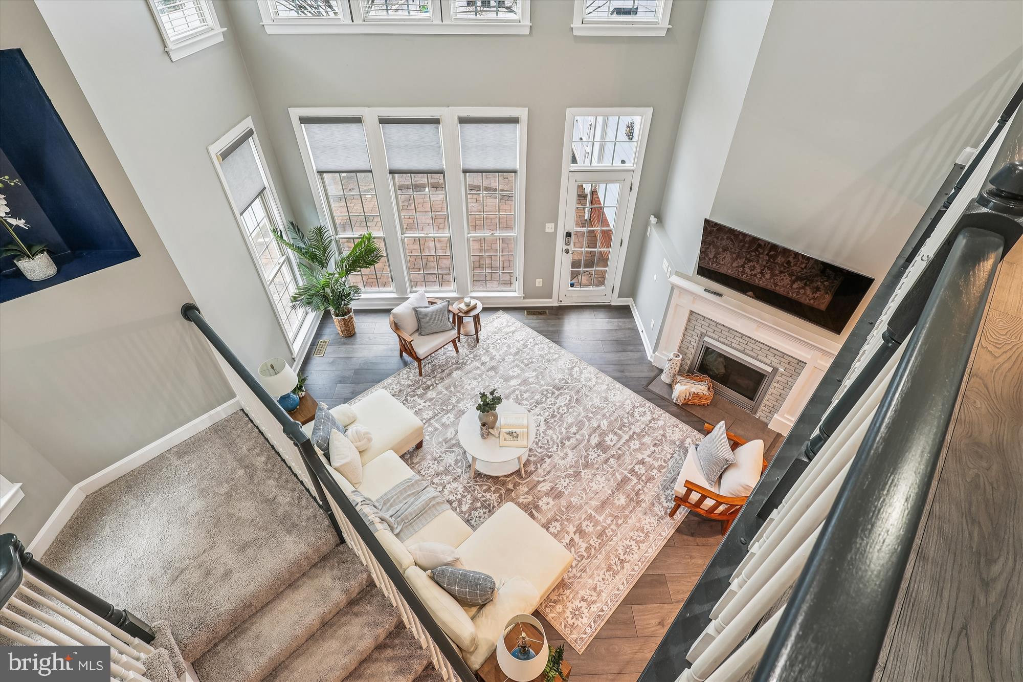 706 Crisfield Way Annapolis, MD 21401 - Photo 19 of 71 a living room with furniture and a fireplace