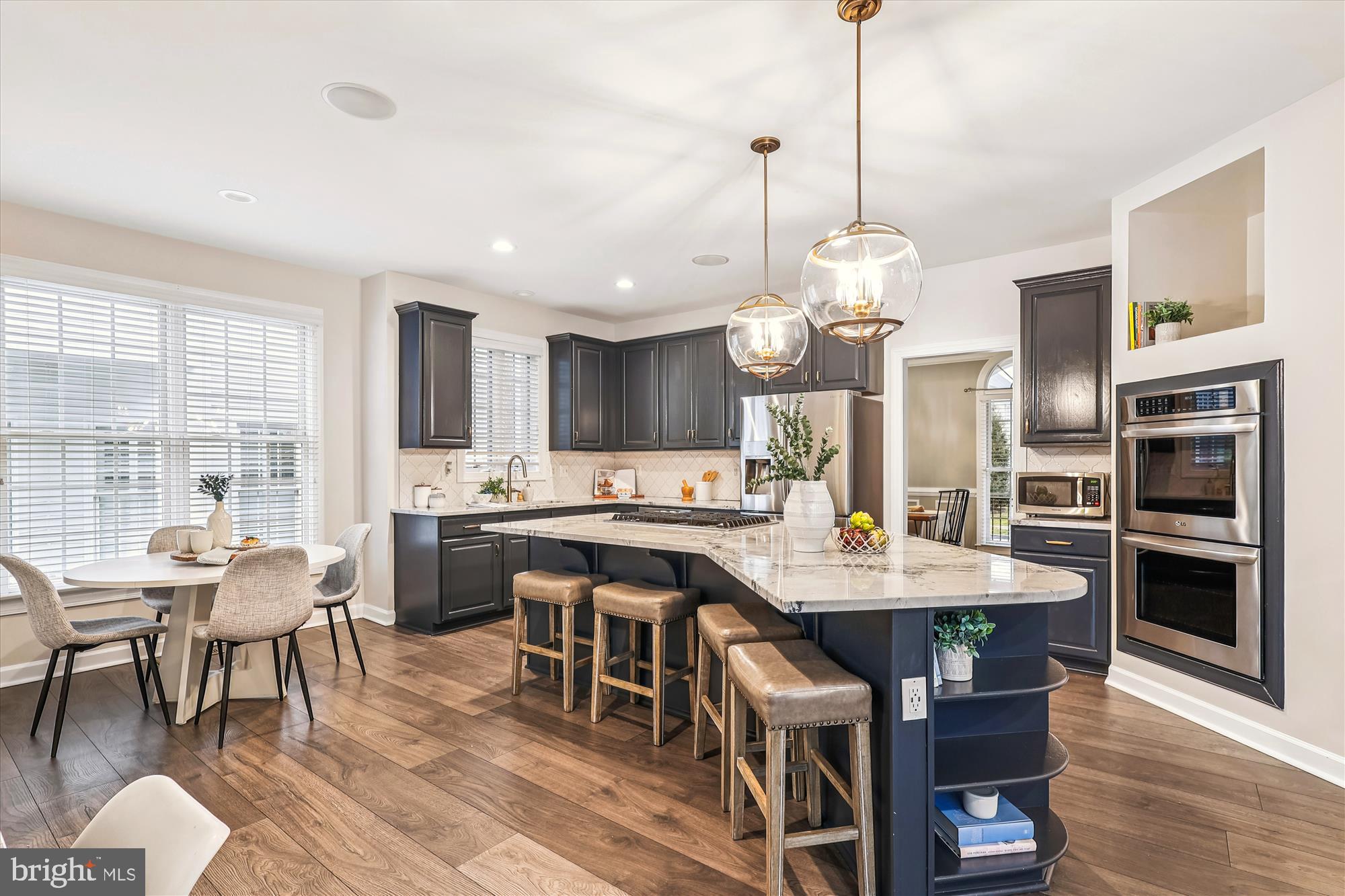 706 Crisfield Way Annapolis, MD 21401 - Photo 2 of 71 a large kitchen with a table and chairs