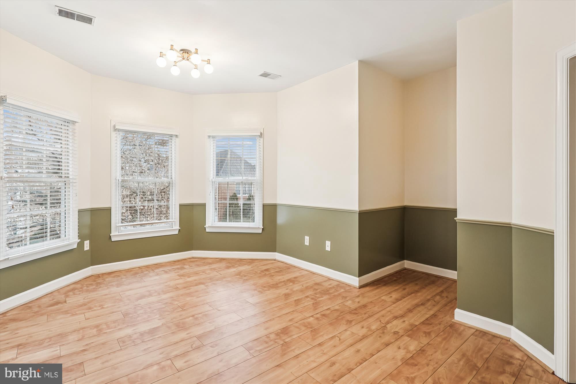 706 Crisfield Way Annapolis, MD 21401 - Photo 29 of 71 a view of an empty room with a window