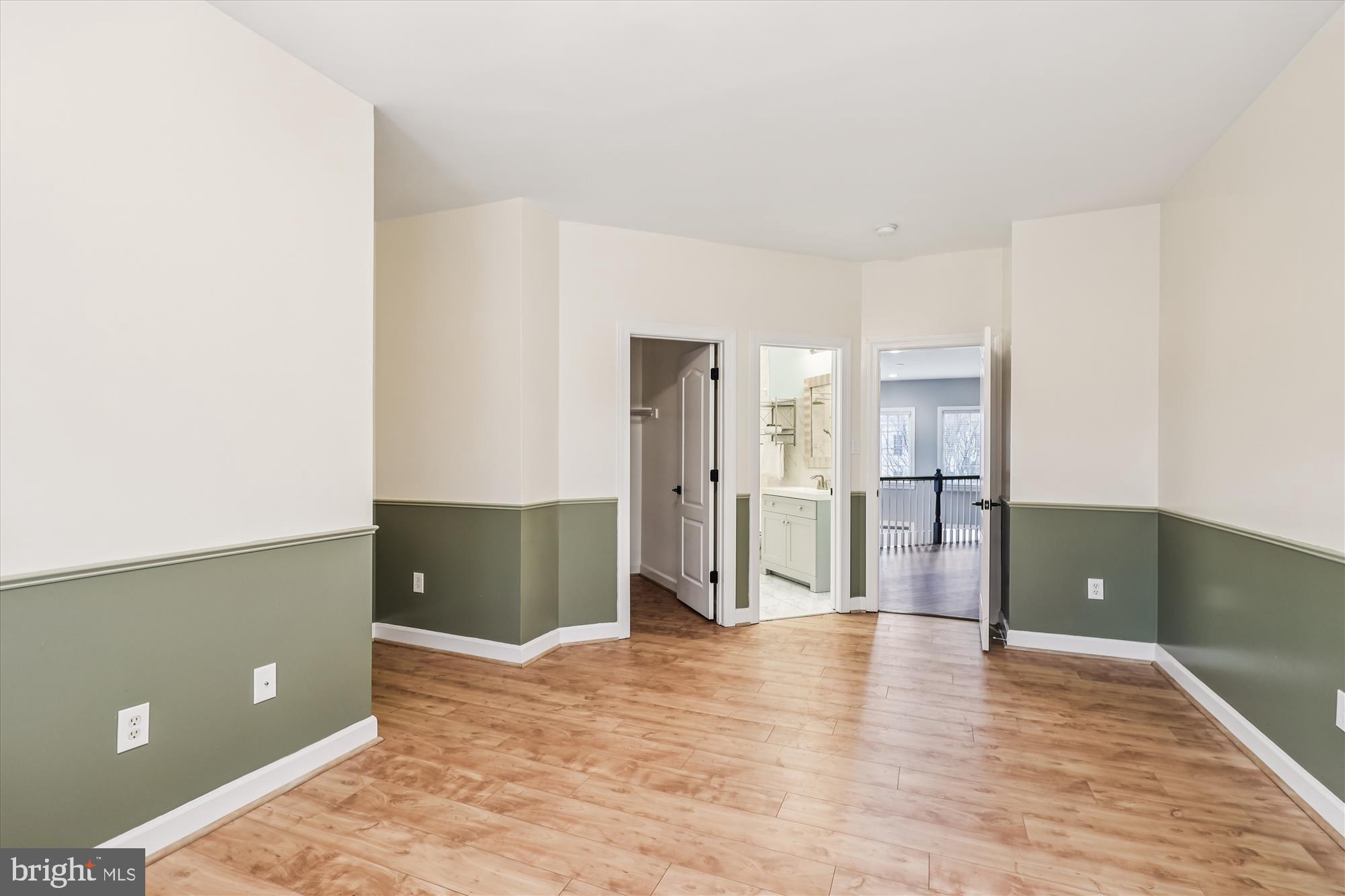 706 Crisfield Way Annapolis, MD 21401 - Photo 30 of 71 a view of a kitchen with refrigerator and wooden floor
