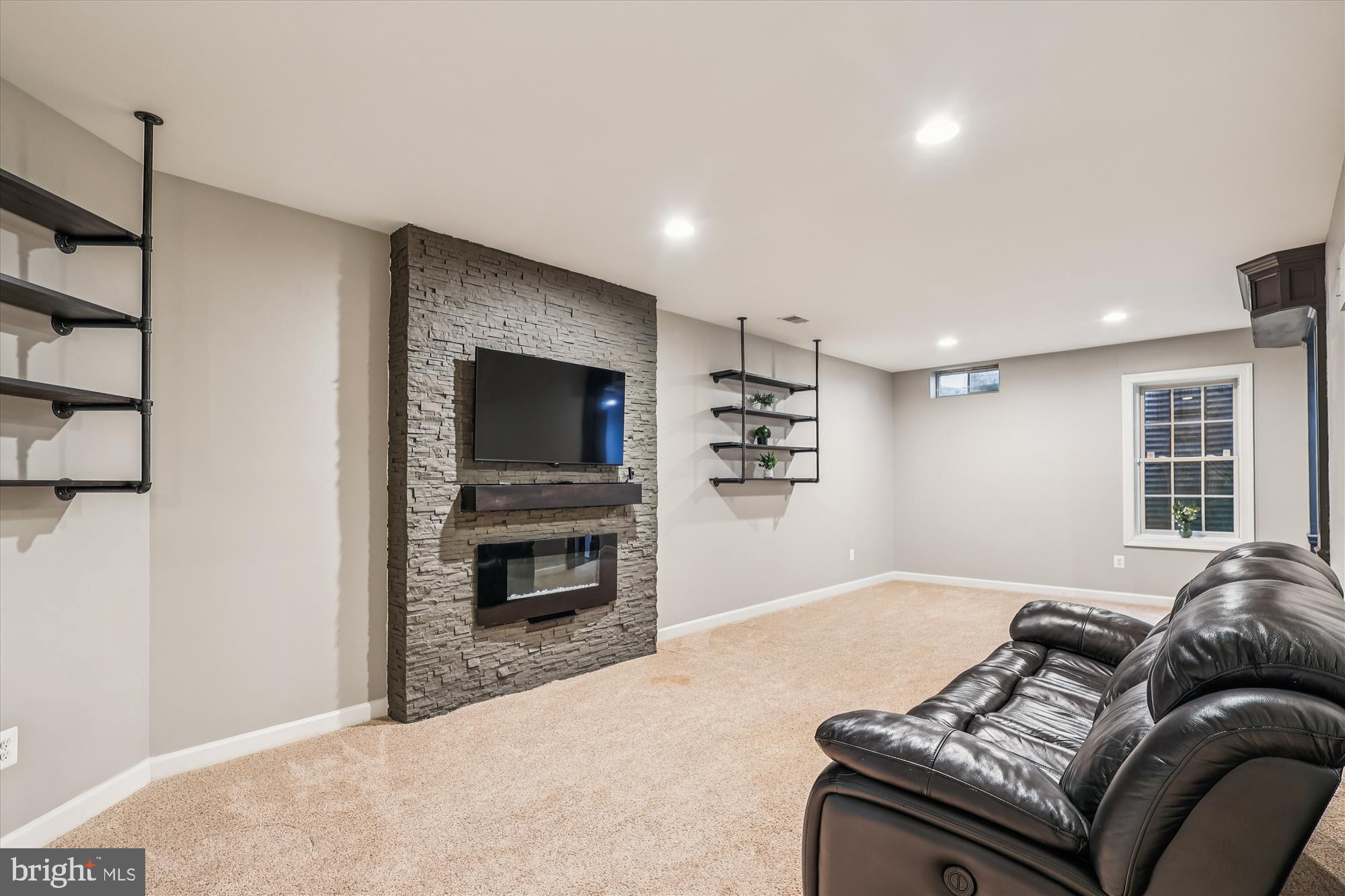 706 Crisfield Way Annapolis, MD 21401 - Photo 43 of 71 a bedroom with a bed and a television