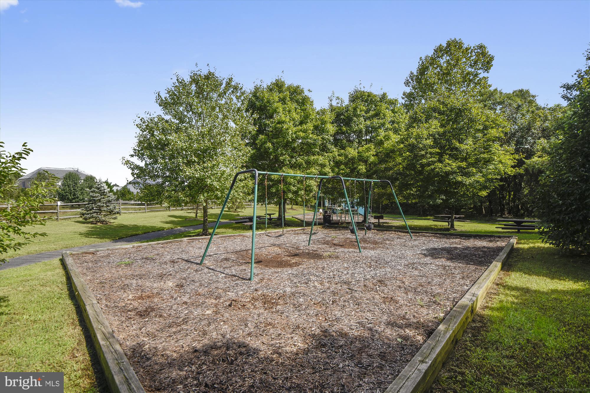 706 Crisfield Way Annapolis, MD 21401 - Photo 62 of 71 a backyard of a house with lots of green space