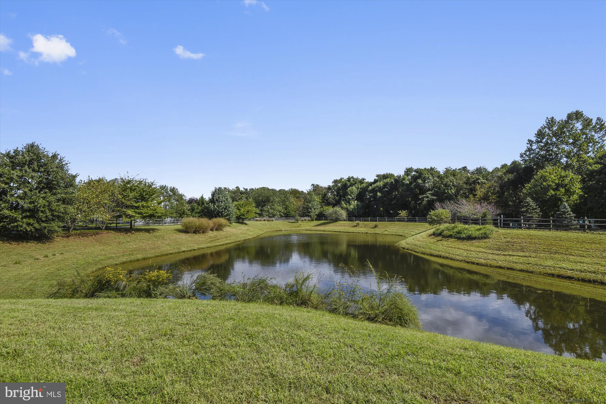706 Crisfield Way Annapolis, MD 21401 - Photo 63 of 71 a view of a lake with a big yard
