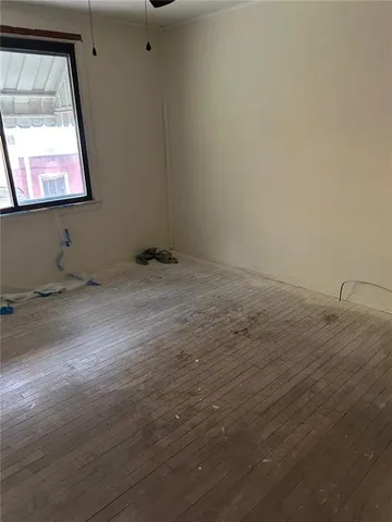 a view of a livingroom with a window