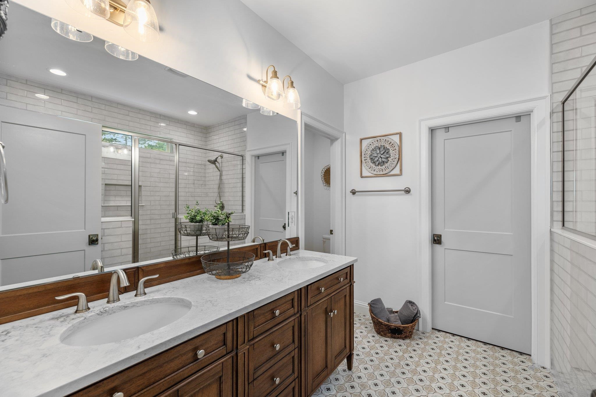 1524 Chalk Road Wake Forest, NC 27587 - Photo 11 of 63 a bathroom with a granite countertop sink a toilet a mirror and shower