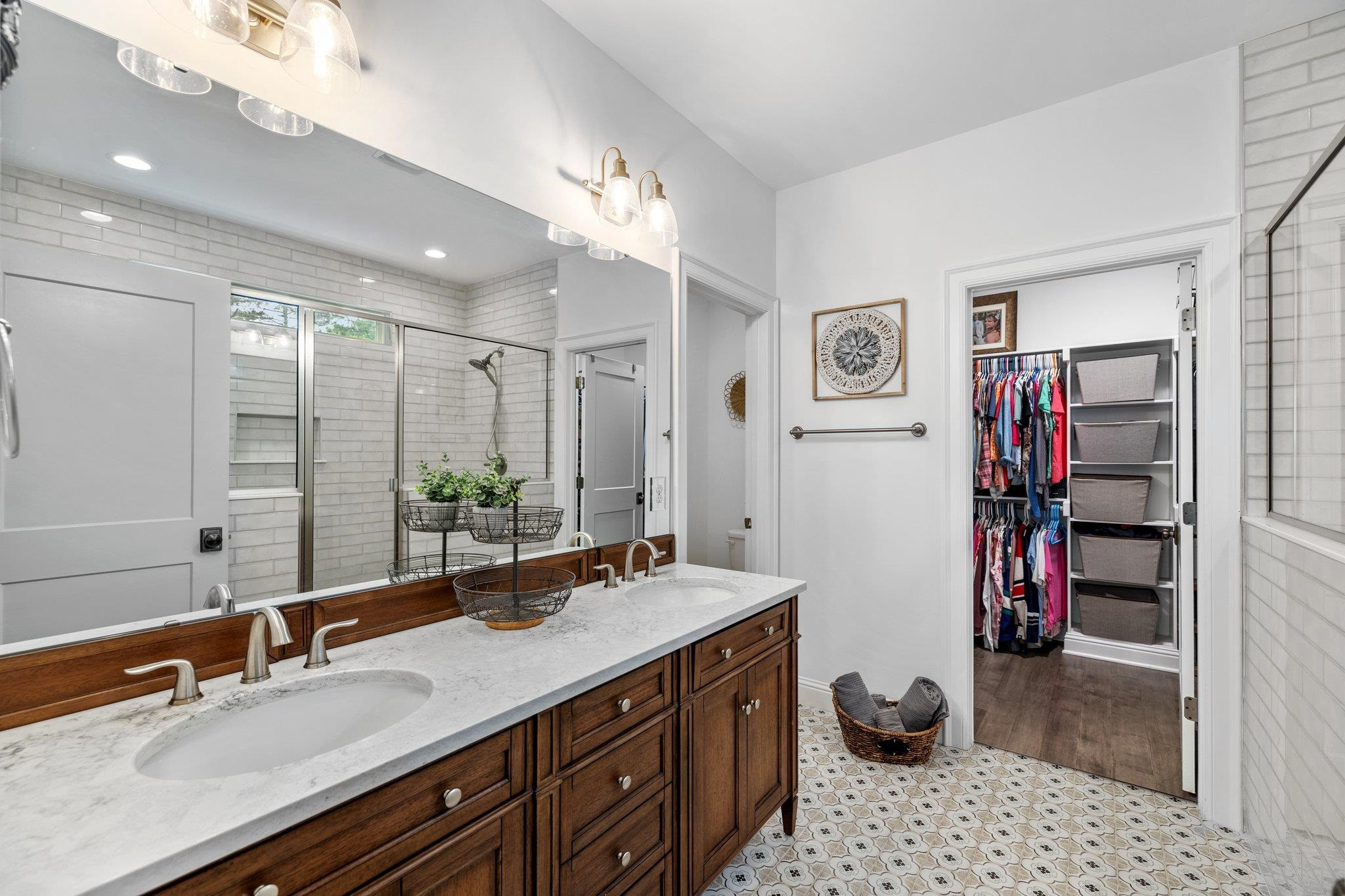 1524 Chalk Road Wake Forest, NC 27587 - Photo 14 of 63 a bathroom with a sink double vanity and a shower