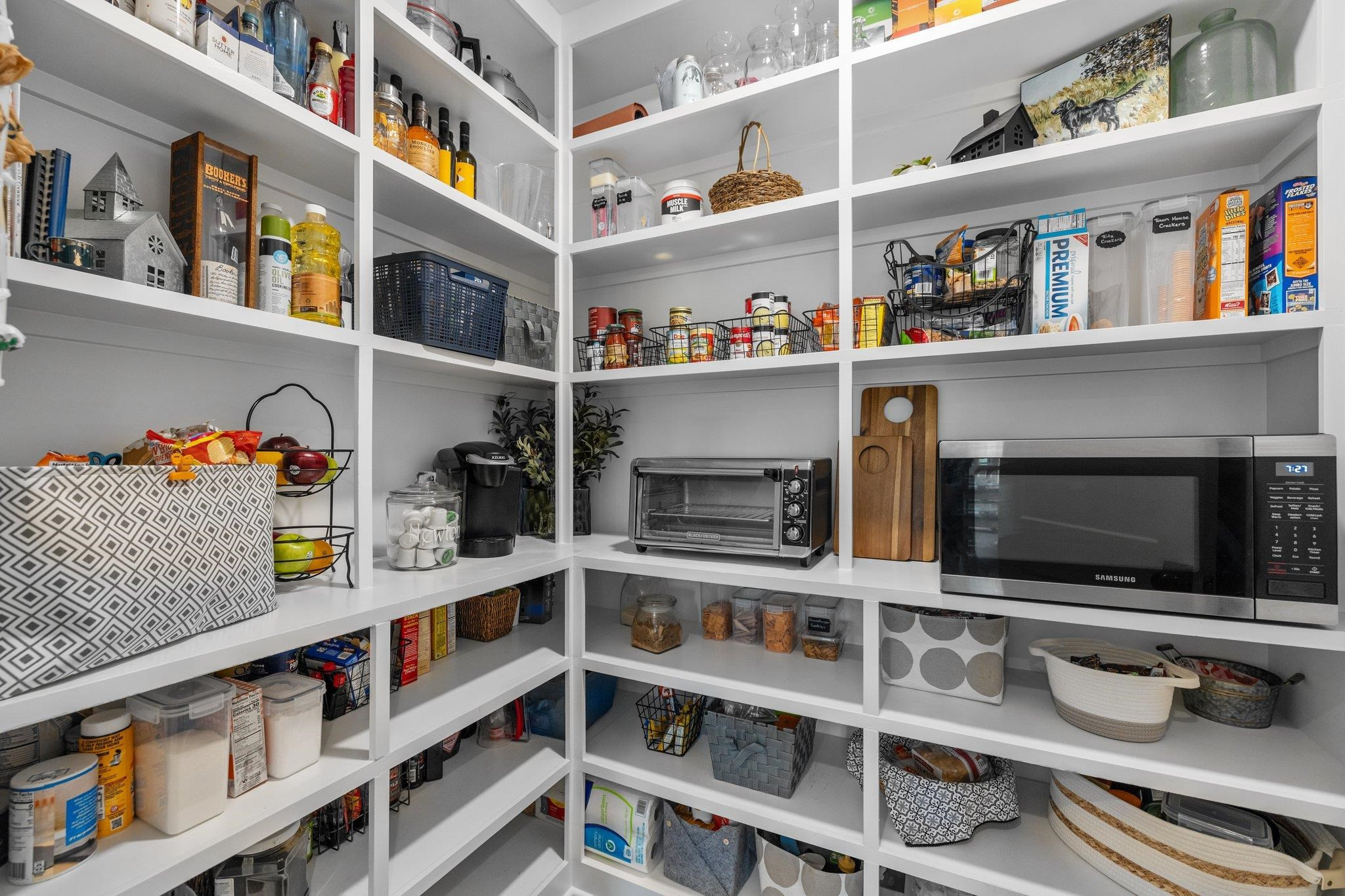 1524 Chalk Road Wake Forest, NC 27587 - Photo 26 of 63 a shelf with books and knick knacks on it