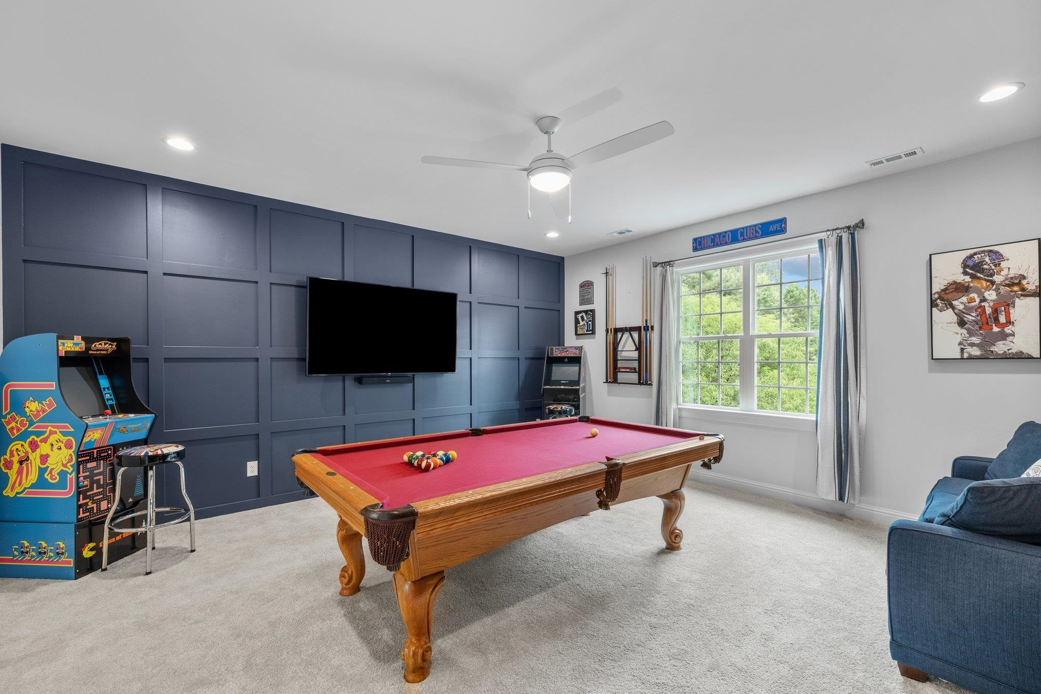 1524 Chalk Road Wake Forest, NC 27587 - Photo 38 of 63 a living room with furniture pool table and a flat screen tv