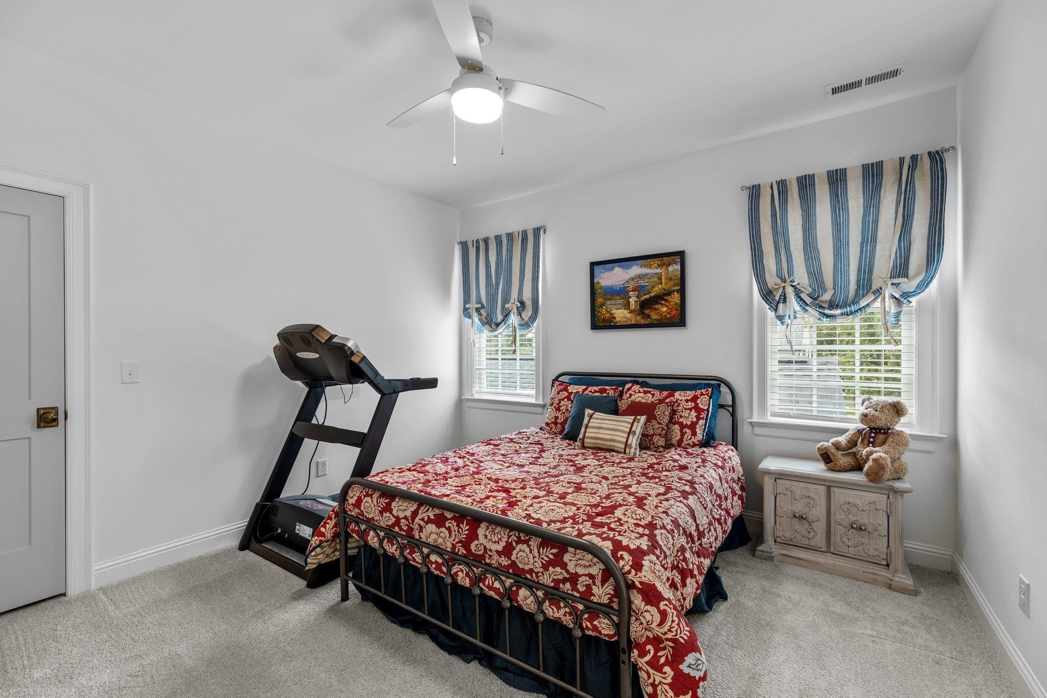 1524 Chalk Road Wake Forest, NC 27587 - Photo 39 of 63 a bedroom with a bed and a chandelier