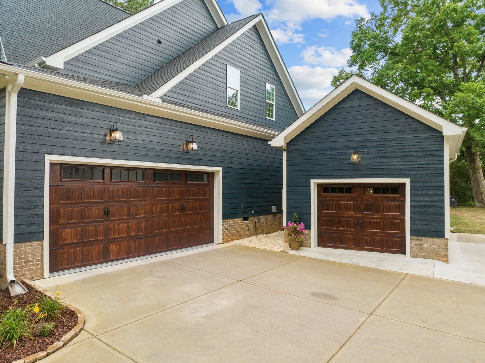1524 Chalk Road Wake Forest, NC 27587 - Photo 4 of 63 a front view of a house with a garage