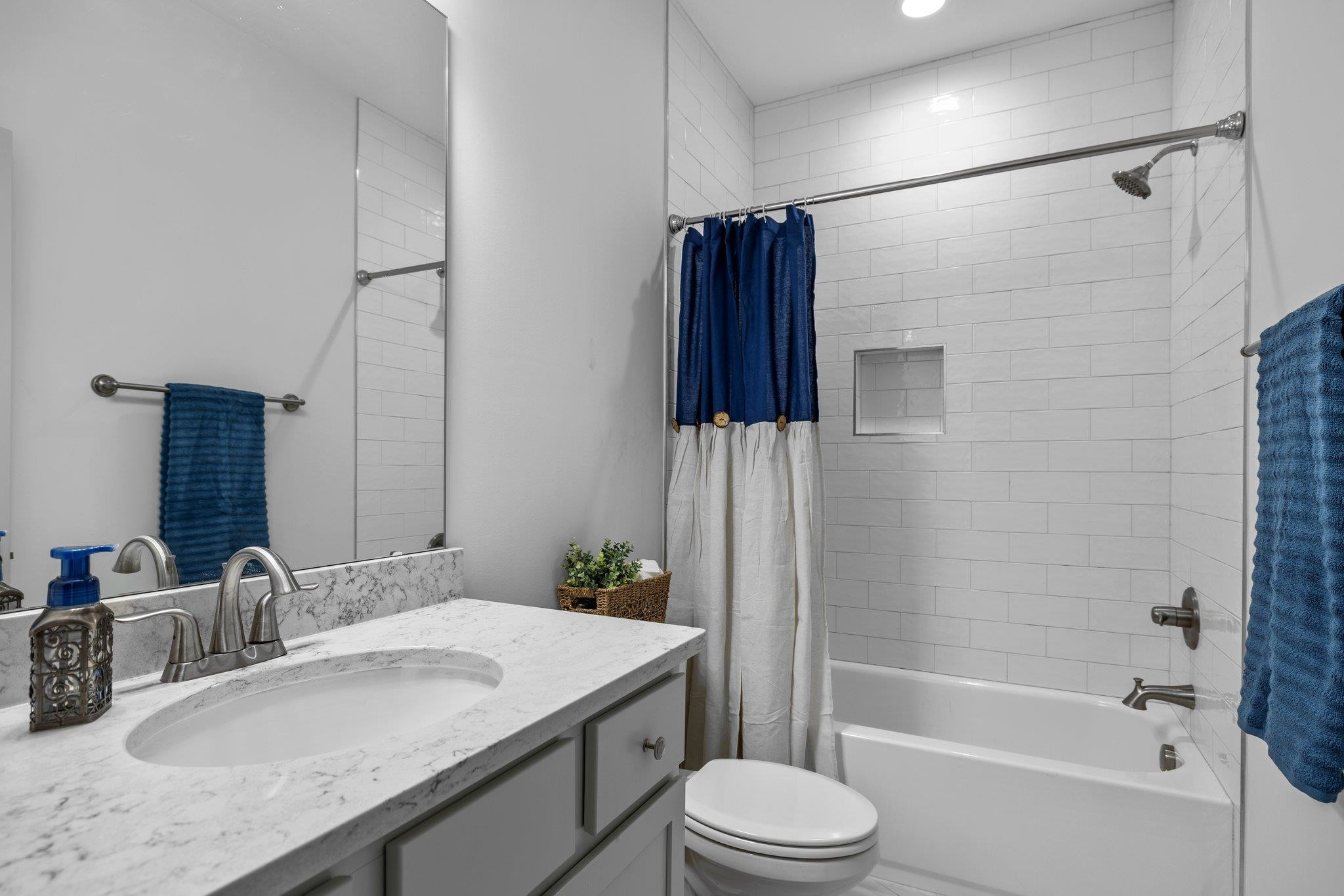 1524 Chalk Road Wake Forest, NC 27587 - Photo 41 of 63 a bathroom with a granite countertop sink toilet and shower