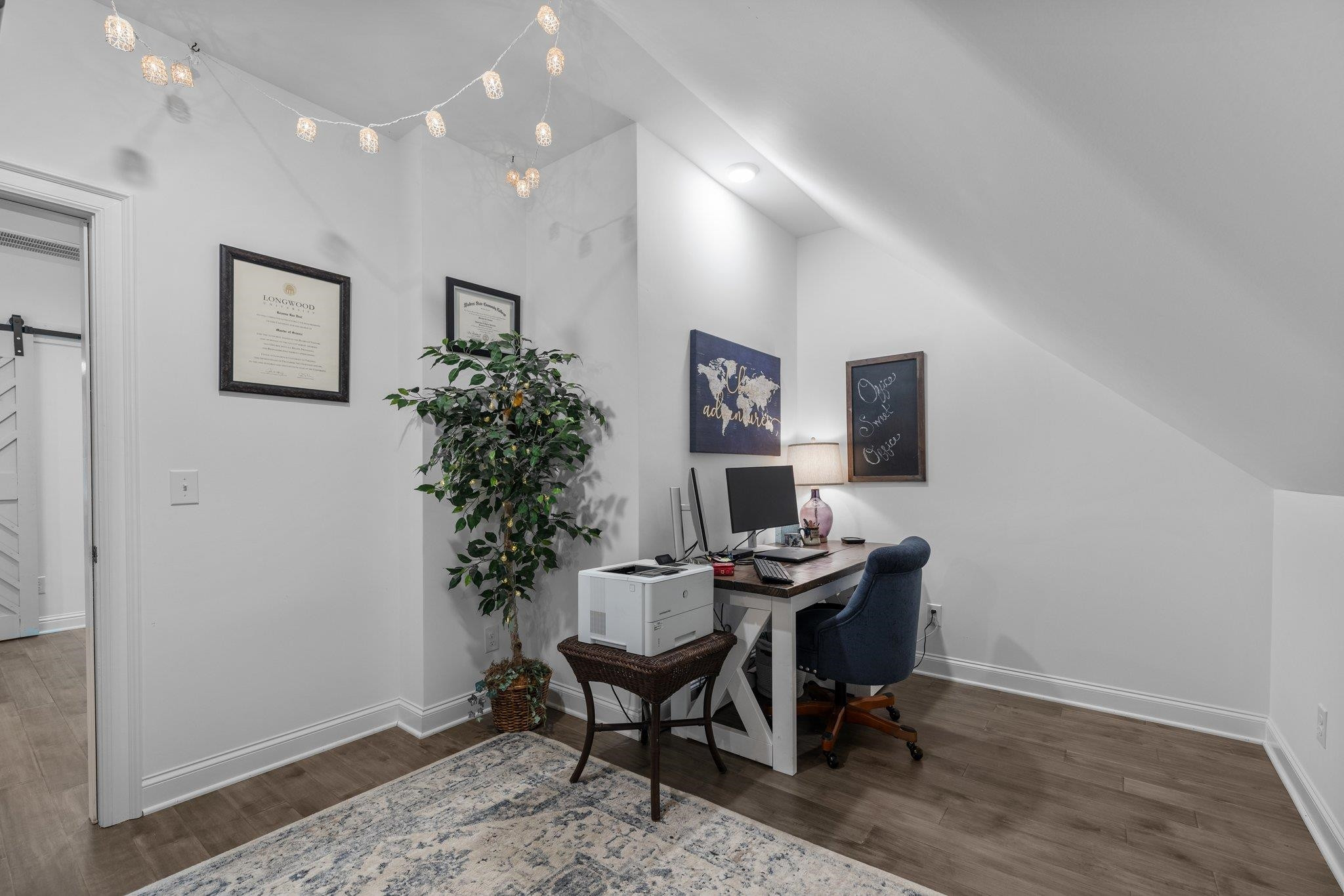 1524 Chalk Road Wake Forest, NC 27587 - Photo 42 of 63 a workspace with furniture and a potted plant