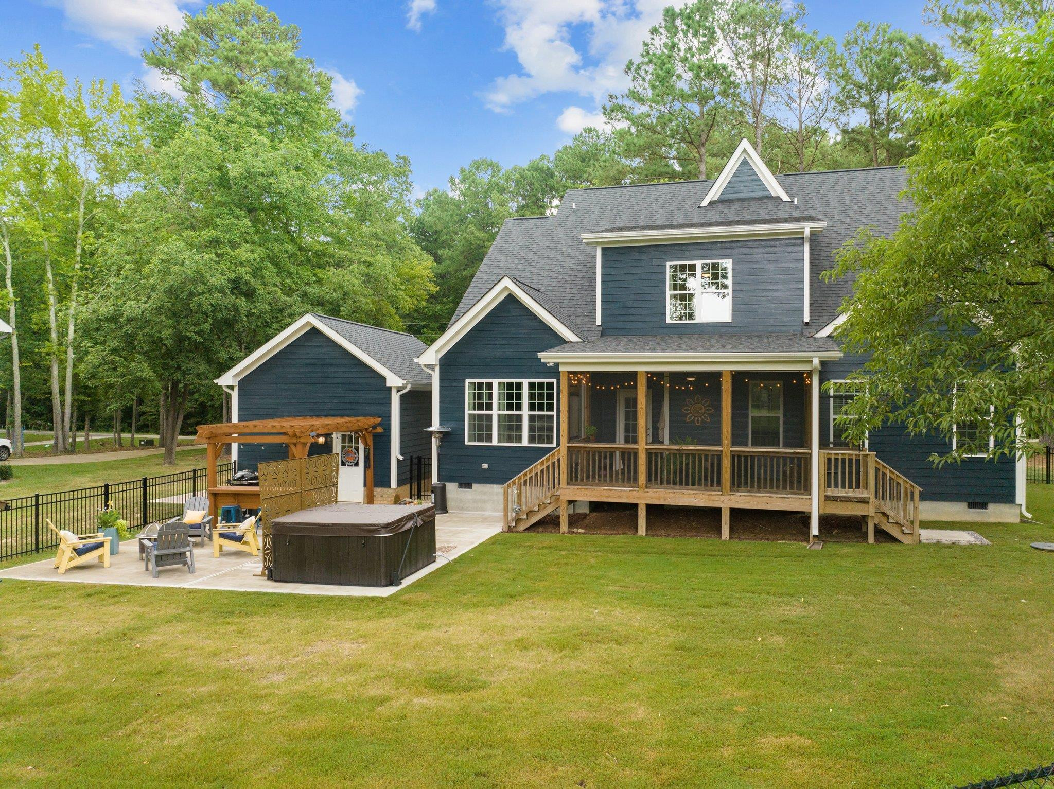 1524 Chalk Road Wake Forest, NC 27587 - Photo 54 of 63 a front view of a house with a yard and balcony