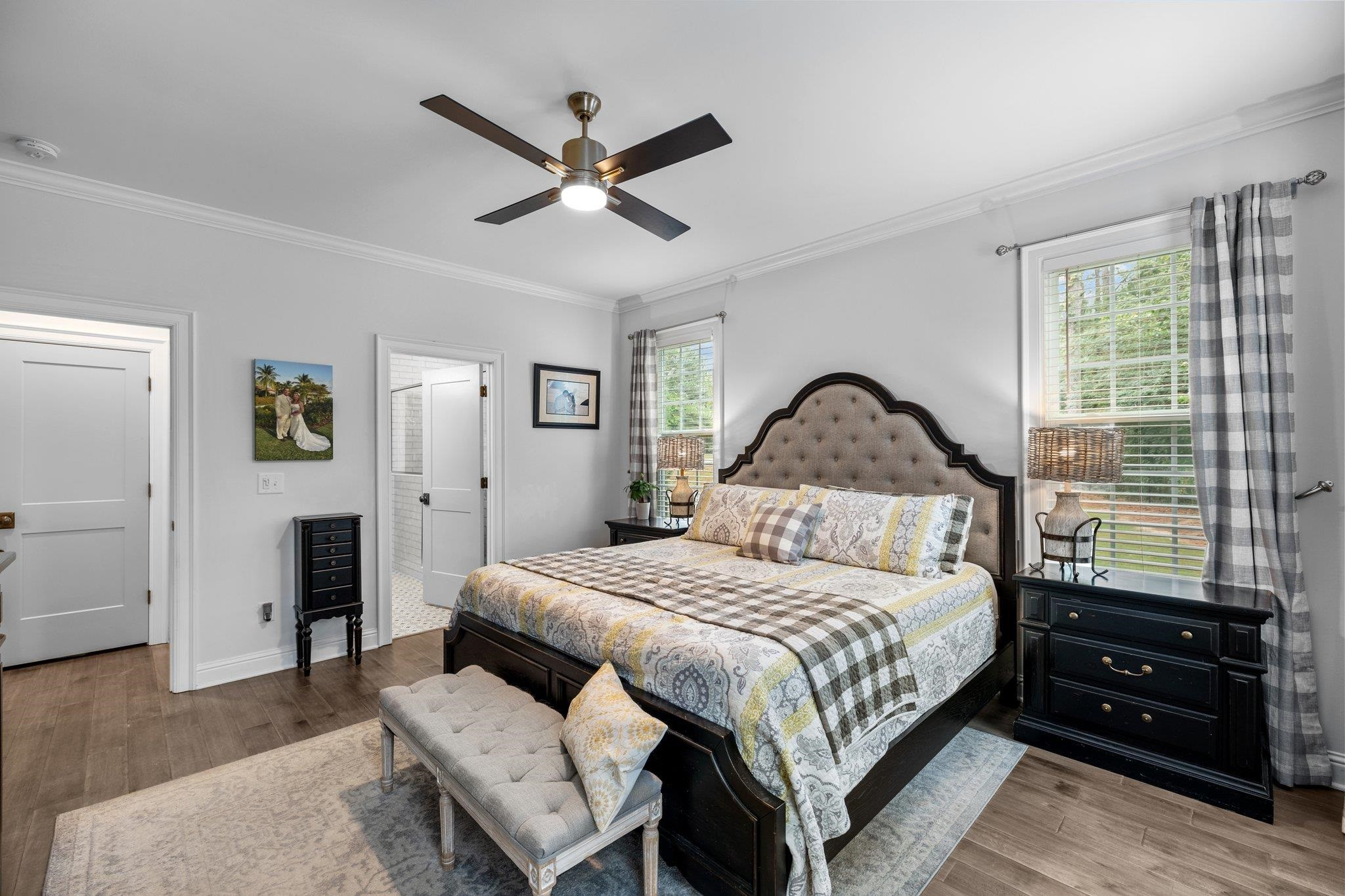 1524 Chalk Road Wake Forest, NC 27587 - Photo 9 of 63 a bedroom with a bed and a chandelier