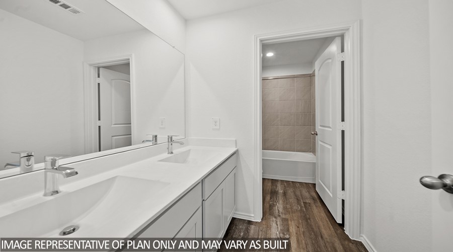15767 Hanson Ridge Drive Montgomery, TX 77316 - Photo 14 of 21 a bathroom with a sink a toilet and shower