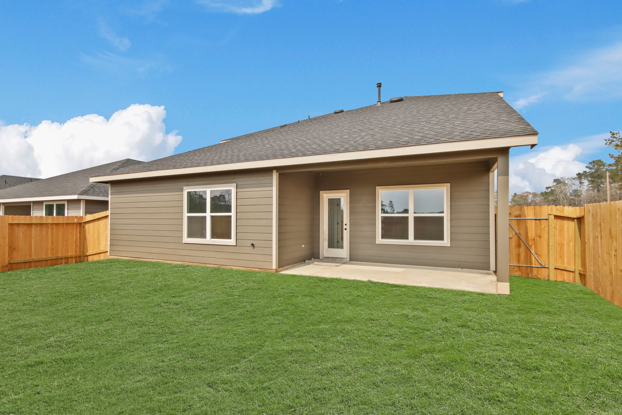 15767 Hanson Ridge Drive Montgomery, TX 77316 - Photo 19 of 21 a front view of house with yard and green space