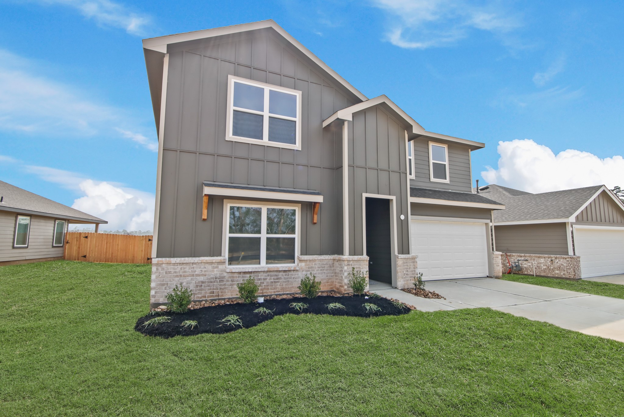 15767 Hanson Ridge Drive Montgomery, TX 77316 - Photo 2 of 21 a front view of a house with a yard