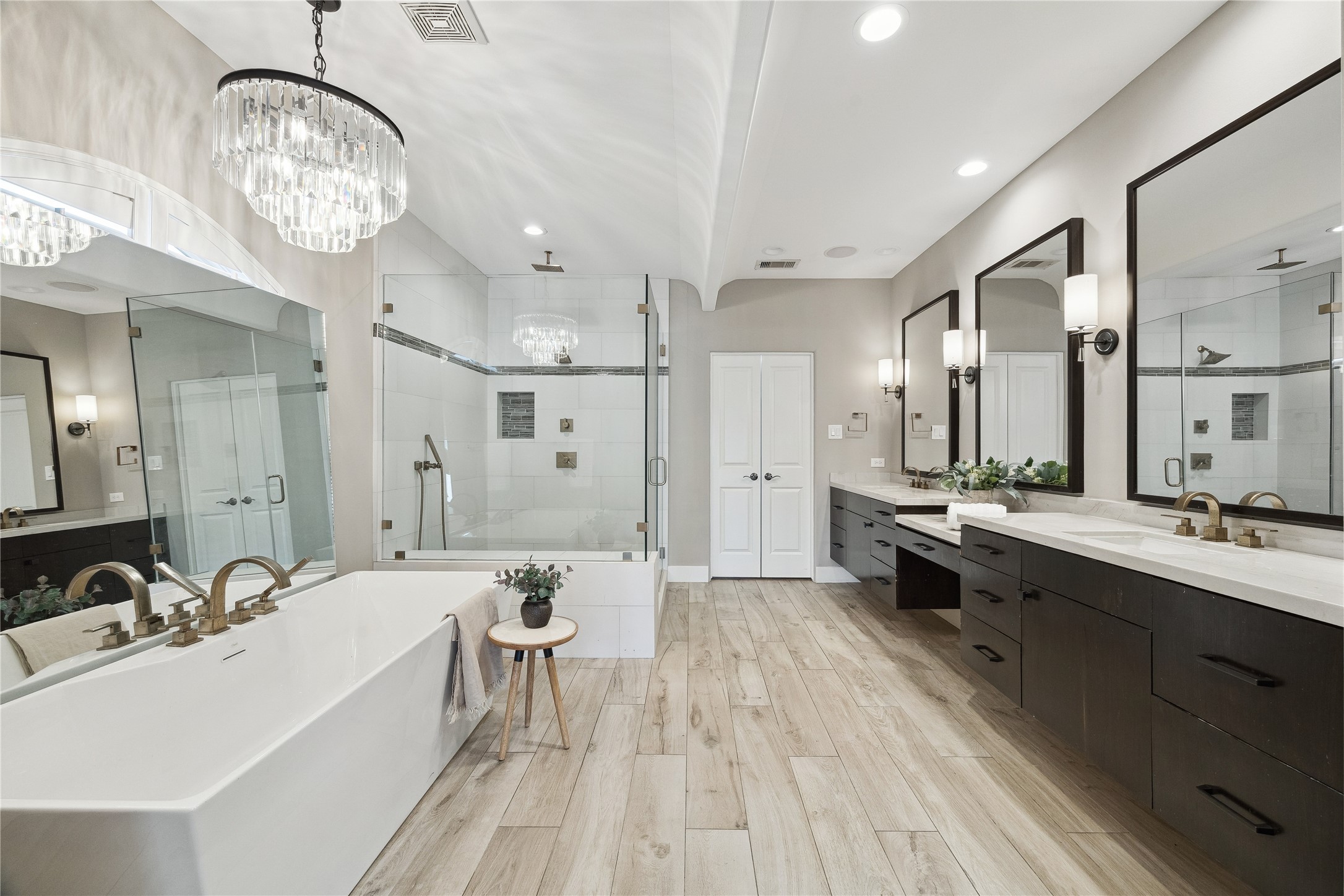6310 Taggart Street, Unit B Houston, TX 77007 - Photo 19 of 37 a large white kitchen with a large window and stainless steel appliances