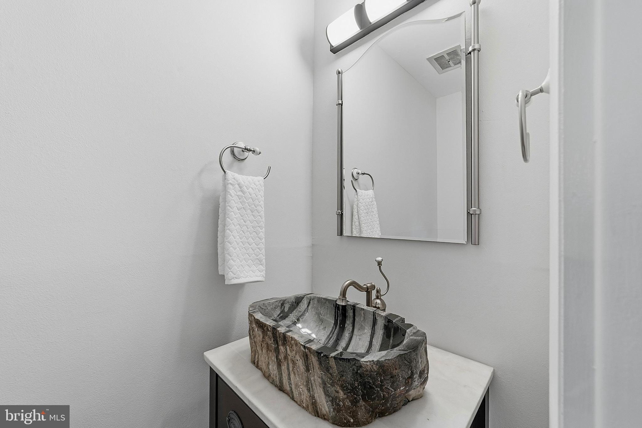 117 Harvest Road Cherry Hill, NJ 08002 - Photo 11 of 35 a bathroom with a sink and a mirror