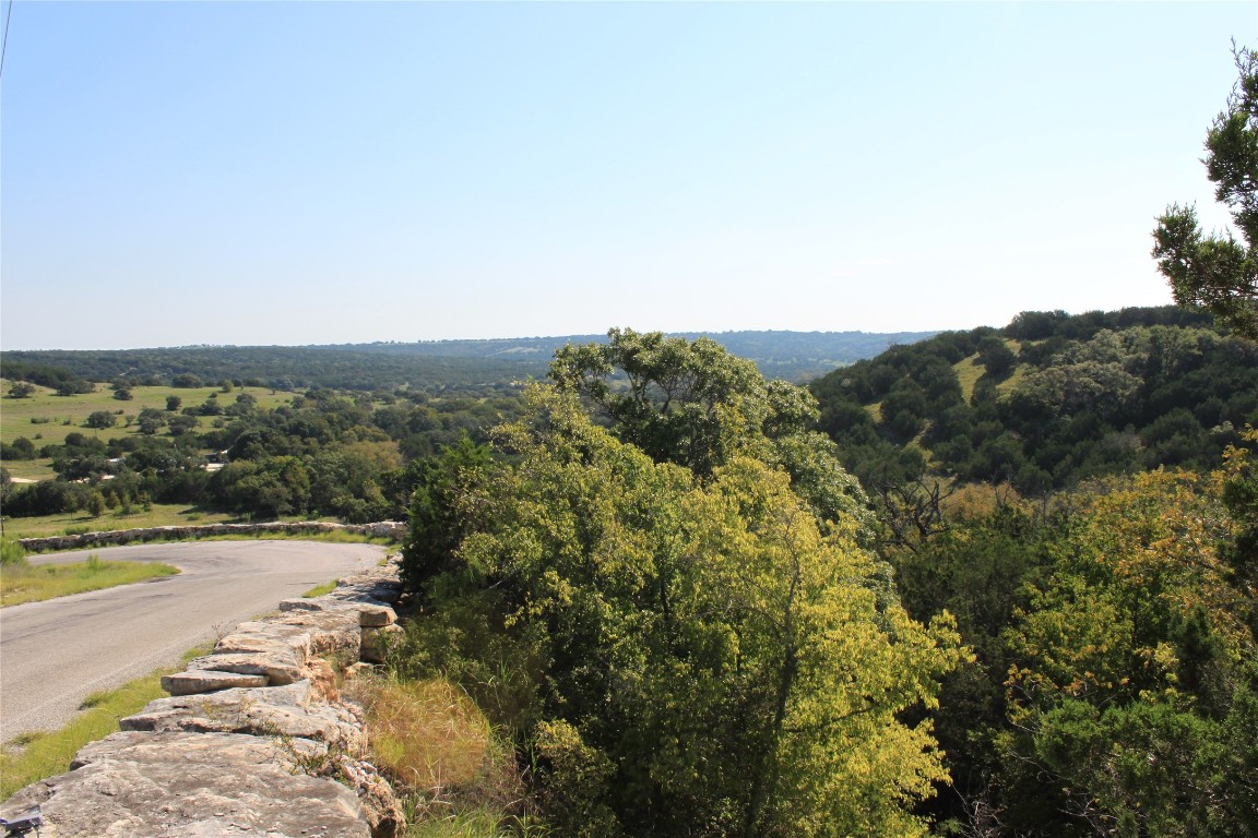 Lot 100 Saddle Ridge Drive Bertram, TX 78605 - Photo 16 of 27 a view of a lake with mountains in the background
