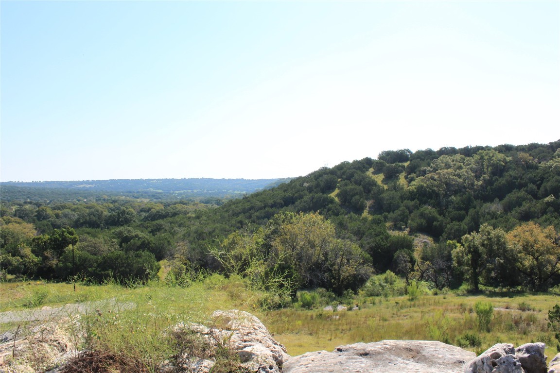 Lot 100 Saddle Ridge Drive Bertram, TX 78605 - Photo 24 of 27 a view of a lake with a city