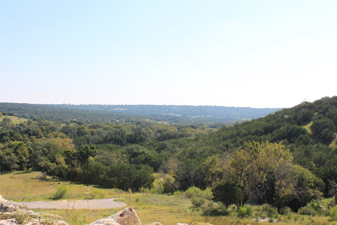 Lot 100 Saddle Ridge Drive Bertram, TX 78605 - Photo 25 of 27 a view of a lake with mountains in the background