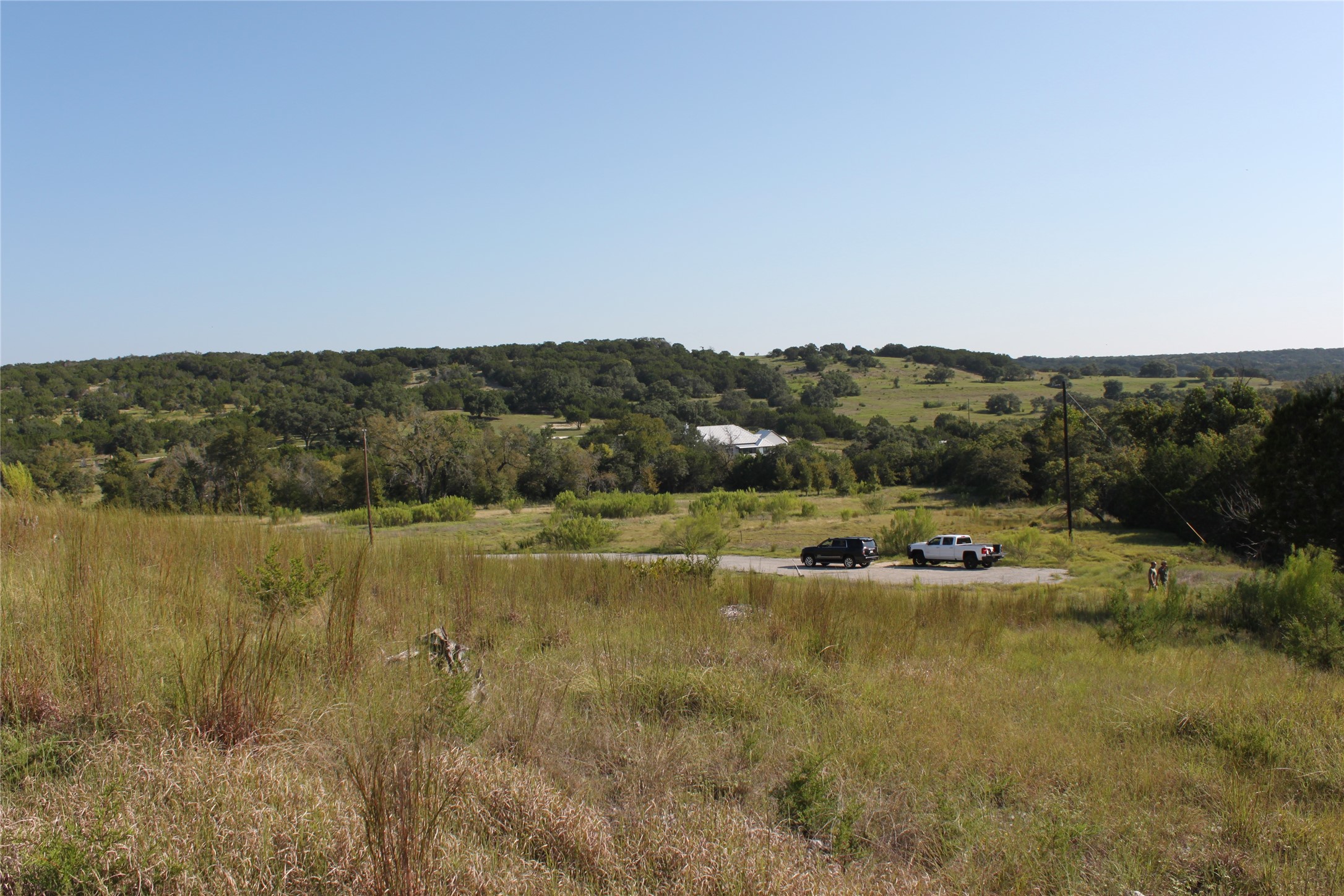 Lot 100 Saddle Ridge Drive Bertram, TX 78605 - Photo 6 of 27 a view of a lake with mountains in the background