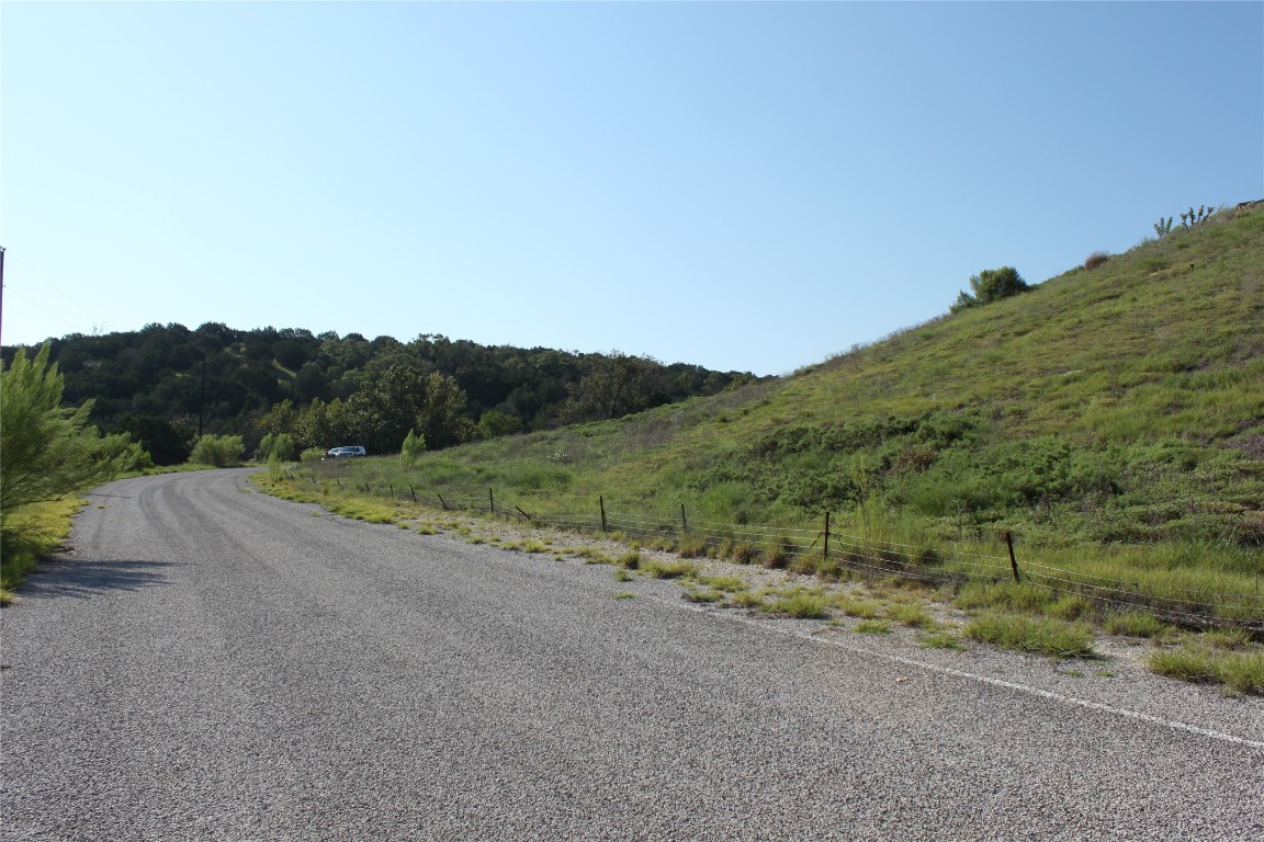 Lot 100 Saddle Ridge Drive Bertram, TX 78605 - Photo 10 of 27 a view of a road with mountain view