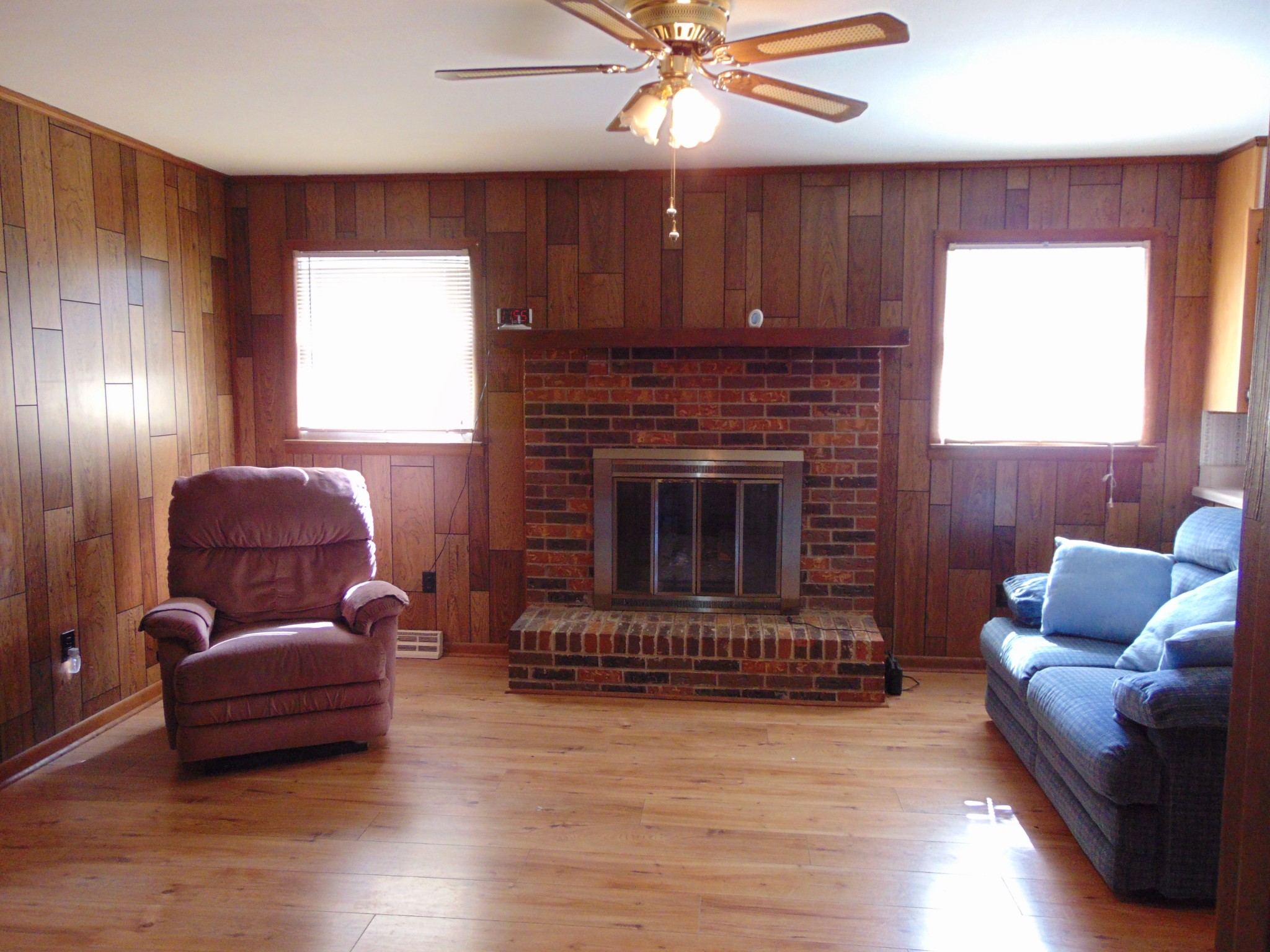 1704 Ann Road Lawrenceburg, TN 38464 - Photo 13 of 20 a living room with furniture and a fireplace