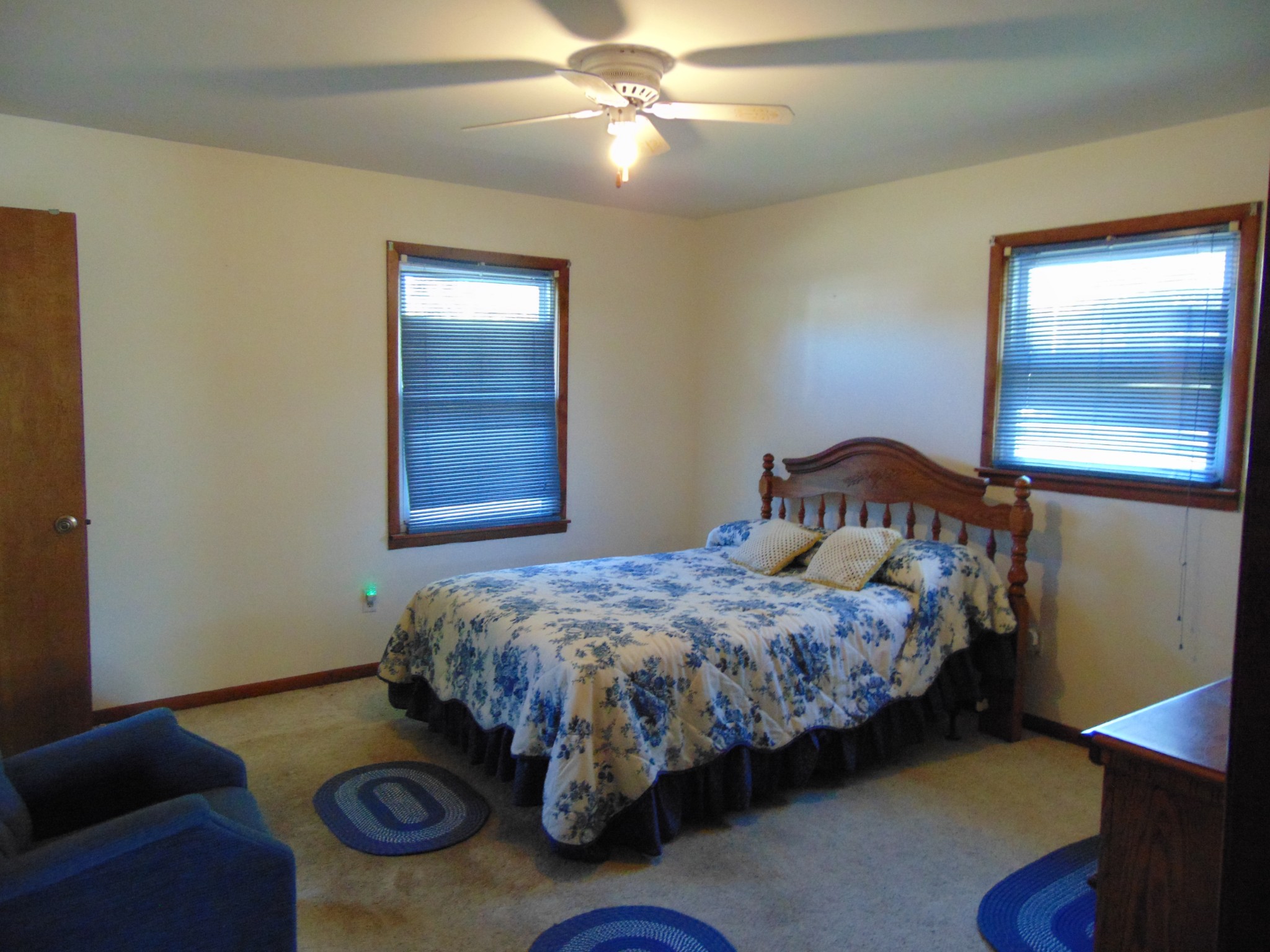 1704 Ann Road Lawrenceburg, TN 38464 - Photo 16 of 20 a bedroom with a bed and a chandelier