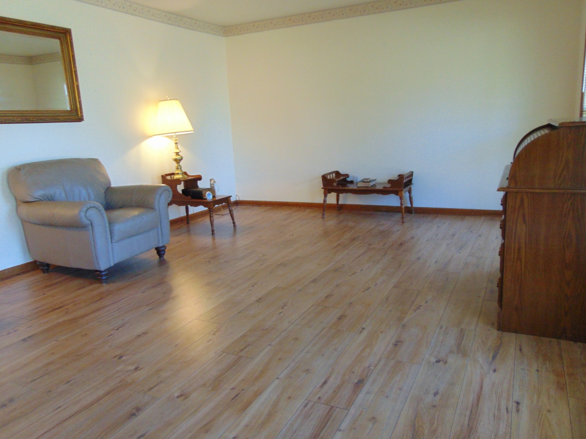 1704 Ann Road Lawrenceburg, TN 38464 - Photo 8 of 20 a living room with furniture and a wooden floor