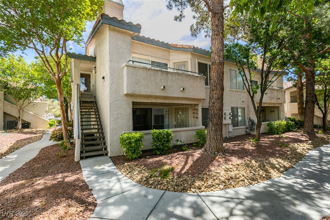 3168 Tarpon, Unit 103 Las Vegas, NV 89120 - Photo 17 of 23 View of property with stairway