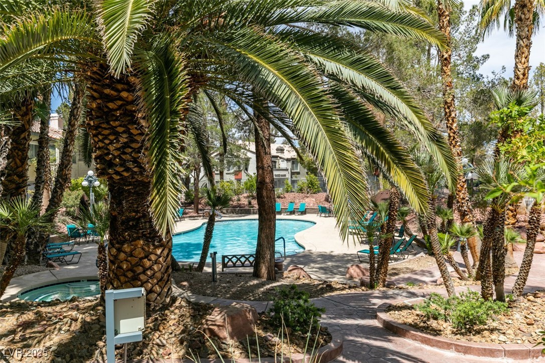 3168 Tarpon, Unit 103 Las Vegas, NV 89120 - Photo 21 of 23 Community pool featuring a patio and a community hot tub
