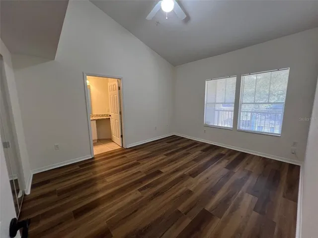 a view of an empty room and window